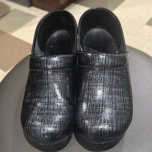 Dansko Black and Metallic Gray Clogs